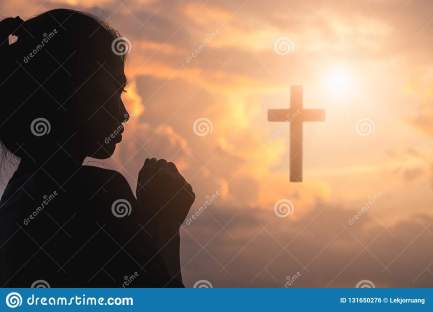 silhouette-young-woman-praying-cross-sunrise-christian-religion-concept-background-131650276